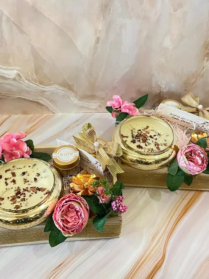These floral and candle favors are perfect for any occasion, from weddings to Diwali. Each one is a small token of appreciation, beautifully packaged.