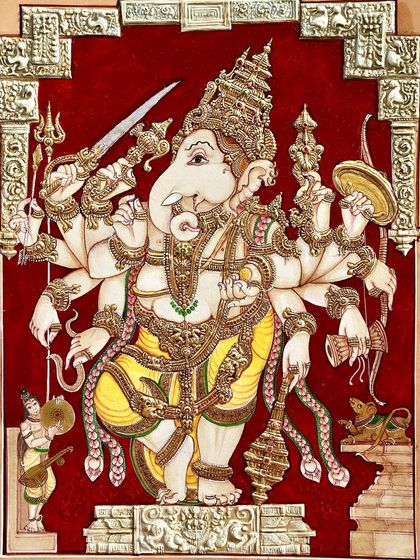 In this powerful depiction, Lord Ganesha is shown with double embossed arching and intricate gold leaf details. He holds a pasha, or noose, representing his power to bind and remove obstacles from one's path.