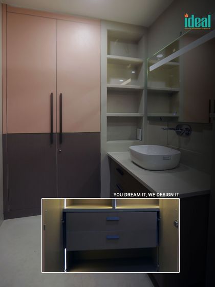 This image showcases a smart and stylish storage solution for a kid's bathroom. The design includes a vanity with organized drawers and an adjacent wardrobe, blending functionality with a chic, modern aesthetic.