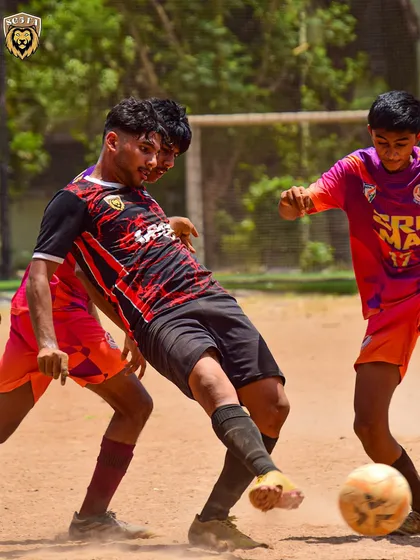 A player striking the ball with force during the 4-0 win in the Youth Championship.