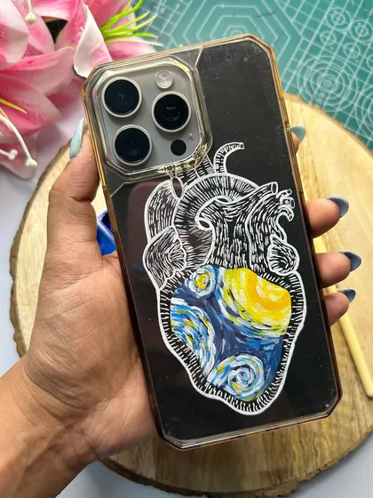 A unique take on a classic, this phone cover features an anatomical heart with Van Gogh's 'Starry Night' painted inside. It’s a perfect example of how I can combine different artistic ideas into one custom piece.