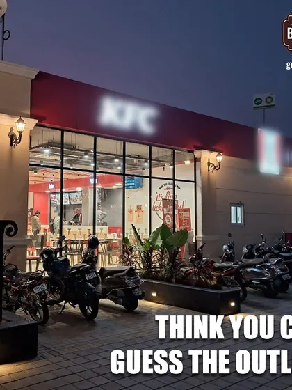 Can you guess this finger-lickin' good outlet? The iconic red and white of our KFC restaurant is a welcome sight for travelers craving some crispy chicken.