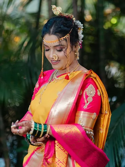 Another lovely portrait of the bride, looking down with a gentle smile.