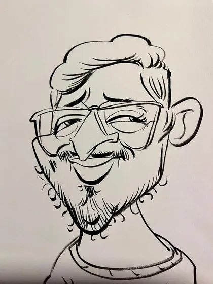 A close-up of a black and white ink sketch. I focus on the eyes and smile to bring out the personality of the person I am drawing.