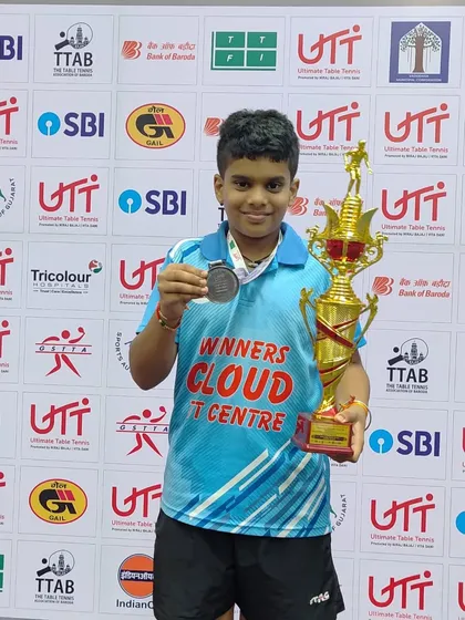 A fantastic start for our young champion Sharvil K, who won a Bronze medal in the Under 11 Boys category at his first National Ranking TT tournament. He is seen here with his trophy and medal.