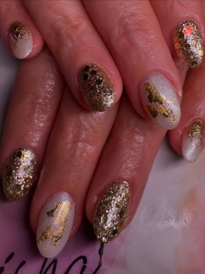 A glamorous wedding-ready set with a mix of full gold glitter and gold foil on a white base.