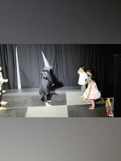 A scene from a play created by our Vyoma kids, featuring a witch character they designed and costumed.
