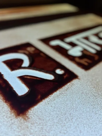 The Republic Bharat logo etched in sand. This was created in anticipation of an exciting project with the news channel, bridging the gap between art and journalism.