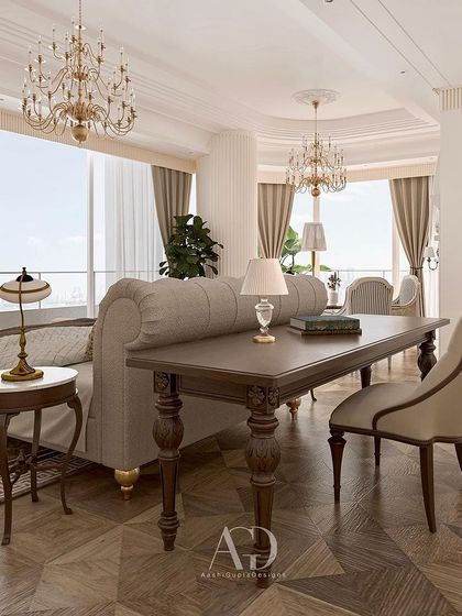 The art of a well-designed space meets a stunning panorama. This bedroom is designed to take full advantage of the view, with a seating area and desk positioned to look out over the city.