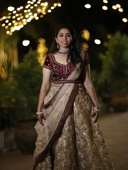 Varsha's stunning reception look. She chose a beautiful velvet and beige lehenga, which I paired with a soft glam makeup look and loose curls.