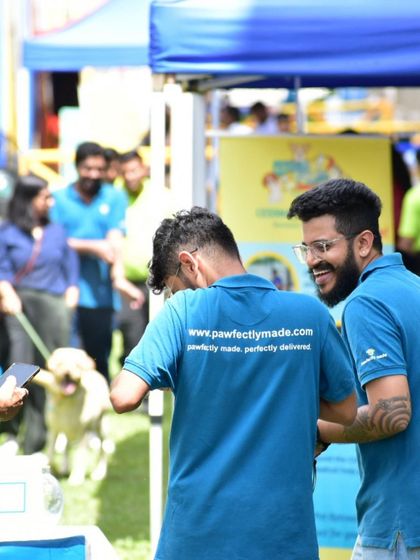 The team having a great time interacting with pet parents.