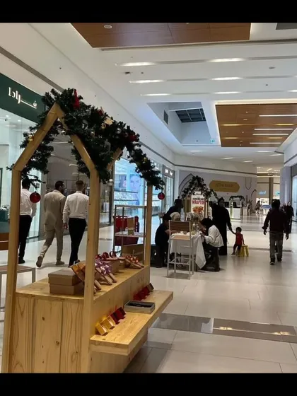 A wider perspective of our pop-up kiosks set up within a mall corridor. We can deploy multiple stalls for larger events, creating a market-like atmosphere for shoppers.