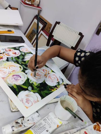 The creation of a beautiful floral piece using thick, impasto-style acrylics, showing a different approach to painting flowers.