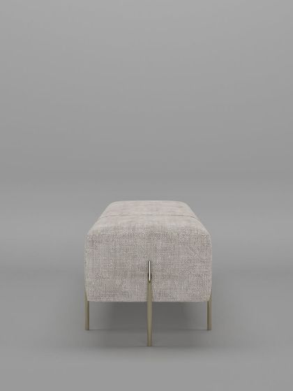 A side view of our minimalist bench, highlighting its clean, block-like form and the delicate, intersecting metal legs that provide support.