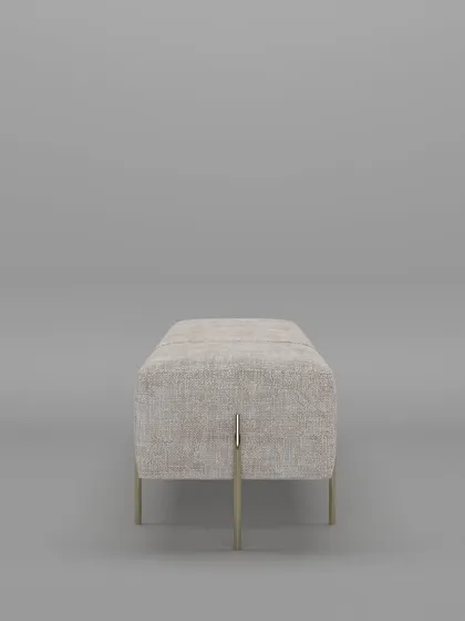 A side view of our minimalist bench, highlighting its clean, block-like form and the delicate, intersecting metal legs that provide support.
