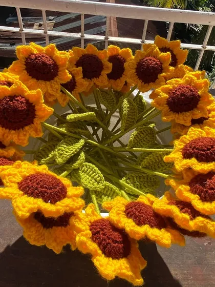 A top-down view of a bright and cheerful sunflower bouquet.