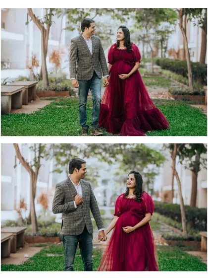 A pair of walking shots from a garden maternity session. The deep red of the gown creates a beautiful contrast with the greenery.