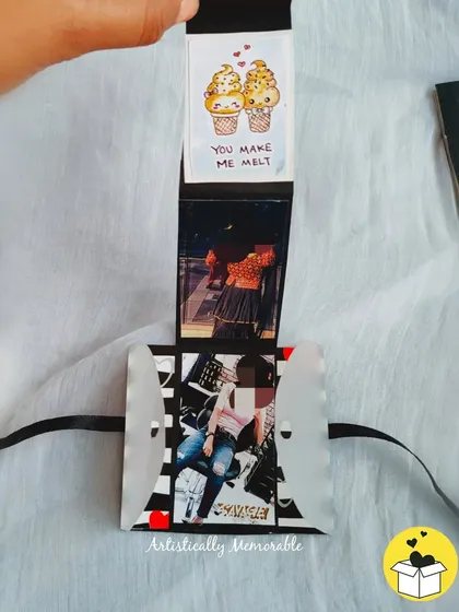 Another view of the waterfall card, showing how it reveals different photos as you pull the tab.
