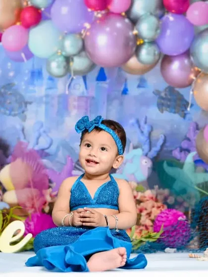 A magical mermaid theme for a very special first birthday. I delight in creating elaborate, imaginative studio sets that turn your child's photoshoot into a fairytale adventure.