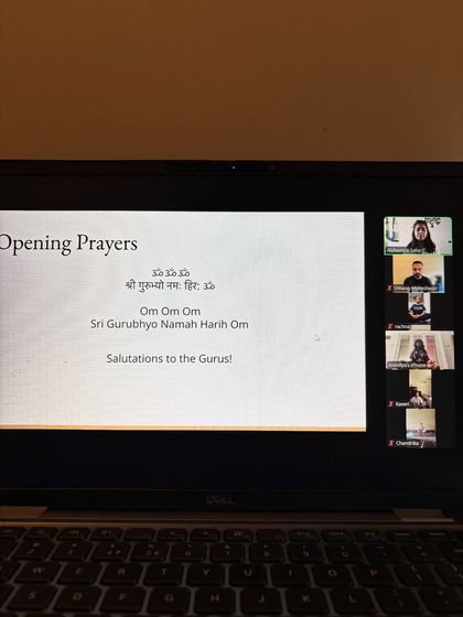 An online philosophy session, beginning with opening prayers. "Om Sri Gurubhyo Namah Harih Om." Salutations to the Gurus. Technology allows us to share this sacred wisdom and connect as a community, no matter where we are.