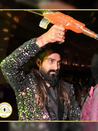 Armed with a sequined jacket and a drink gun, I am ready to get the party started. This is how we serve shots with style and a bit of drama.