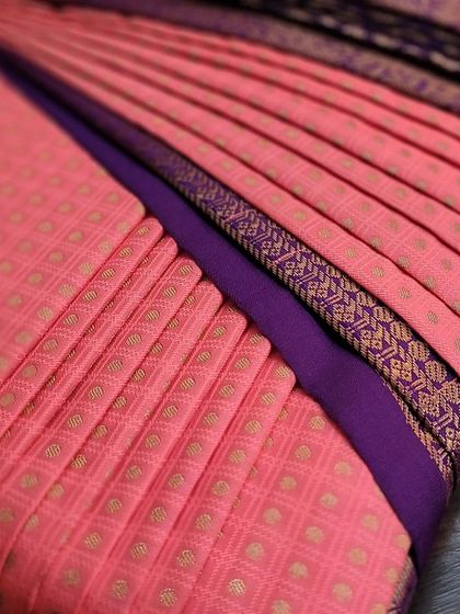 Another detailed shot of the box-folded saree, showing the precision involved.