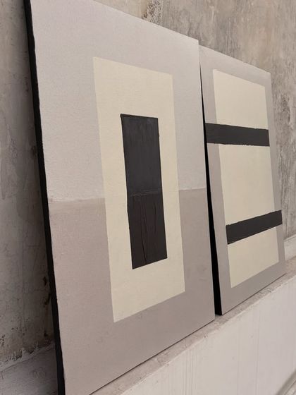 The smaller geometric paintings from the Surat set. Their clean lines and simple color blocking make them versatile pieces that can be arranged in different ways.