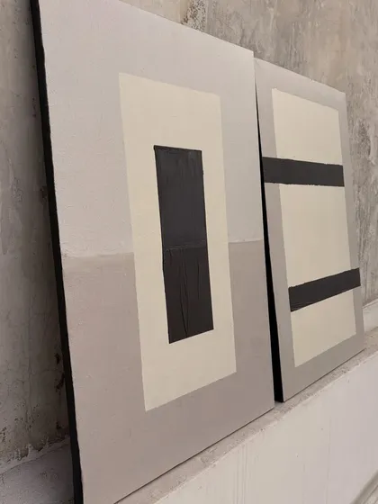The smaller geometric paintings from the Surat set. Their clean lines and simple color blocking make them versatile pieces that can be arranged in different ways.