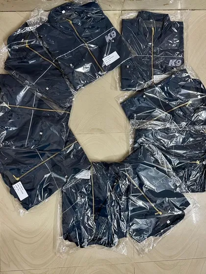 Getting a batch of my trainer vests ready to ship out. Each one is packed and inspected by me to ensure the quality is perfect before it reaches another trainer or handler.