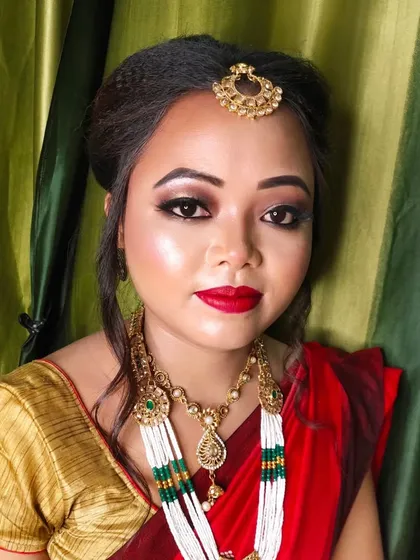 Another shot of the beautiful Assamese bride, showcasing her complete look.