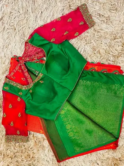 The front view of the green and pink blouse, showing how the contrasting colors create a vibrant look.