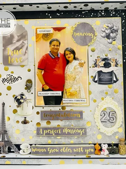 For a silver jubilee, we created this custom 25th-anniversary frame. The black and gold theme, along with romantic embellishments and a central photo, commemorates a quarter-century of a perfect marriage.