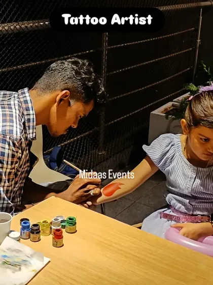 Another happy customer at the tattoo painting station. I provide a dedicated table and all the necessary supplies so the artist can work efficiently and the kids can get creative.