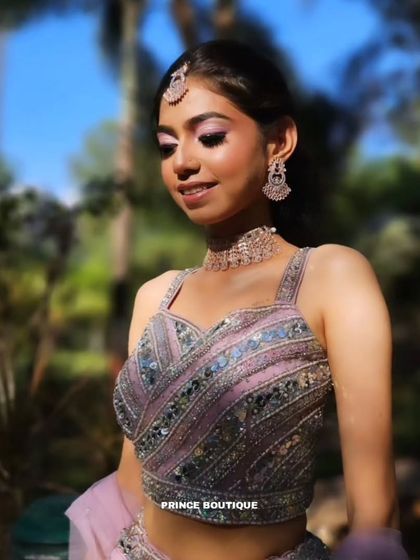 Another close-up of the lavender lehenga's blouse, showing the craftsmanship and detail that make this outfit so special.