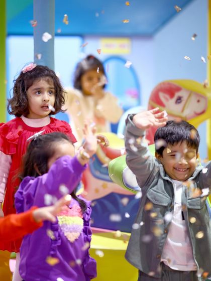 A confetti explosion adds to the excitement of the jungle party. It's a moment of pure celebration and joy for all the little explorers.