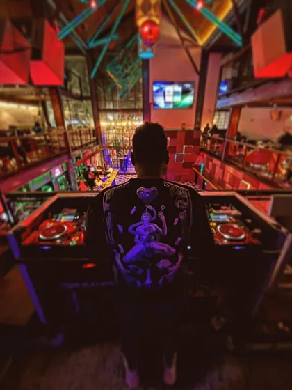 A view from my console at Loft38. I love the multi-level setup of this venue, which allows me to connect with the crowd on every floor and create a massive, unified party atmosphere.