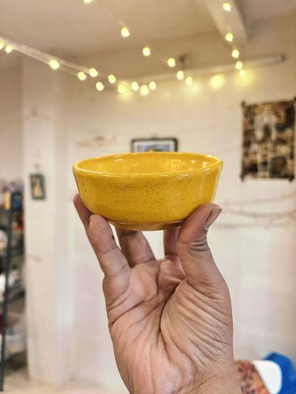 These bright, colorful pieces perfectly reflect the student's sunny personality. From hand-built forms to glazing without fear, she really let herself explore and enjoy the process during her beginner's course.