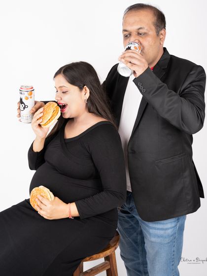 "Eating for two" taken to a whole new level! This funny and relatable shot about pregnancy cravings is a fantastic memory to capture.