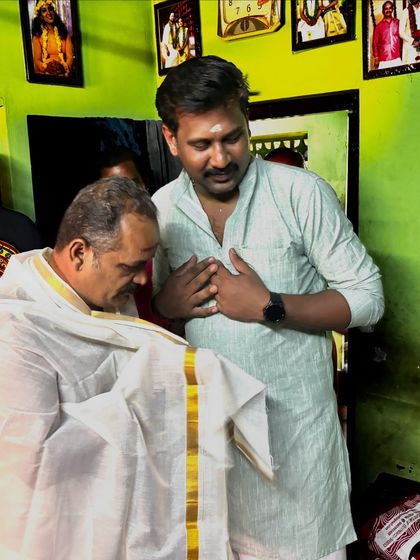 A moment of respect and gratitude as we honor our Guru during the 'Guruvandanam' ceremony.