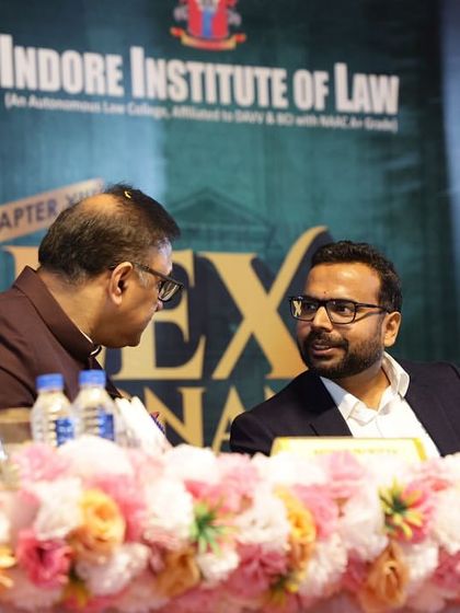 Our Partner, Saurabh Bindal, in discussion with another dignitary at the Lex Bonanza International Law Fest at the Indore Institute of Law, where he was a guest of honour.