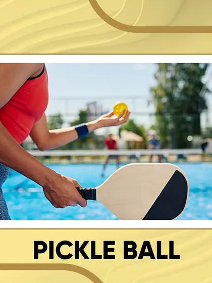 A player gets ready to serve in a game of pickleball. We offer courts for this fun and fast-growing sport that combines elements of tennis, badminton, and table tennis.
