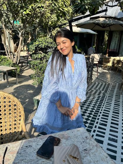 A happy, sun-kissed moment in my blue dress. My goal is to find outfits that bring you joy.