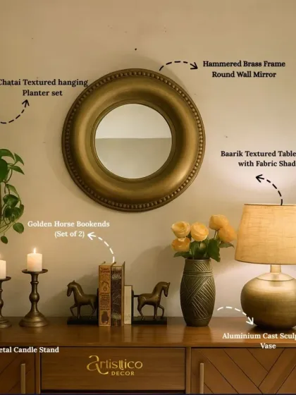 I believe every corner of your home should tell a story. Here, I've styled a console with some of my favourite pieces: golden horse bookends, a textured aluminium vase, and a baarik shade lamp to create a warm, inviting nook. It’s these little details that make a house feel like a home.