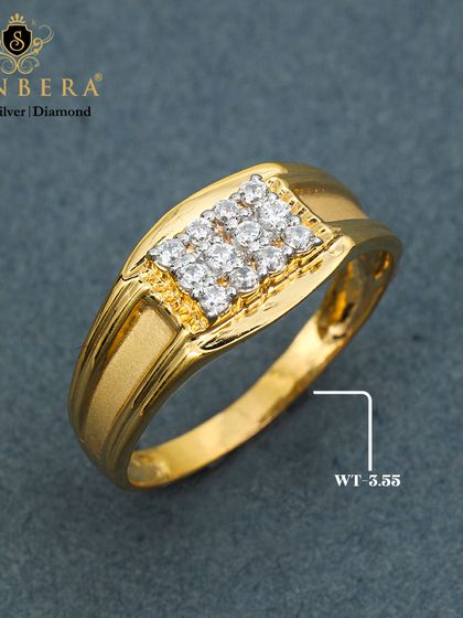 A sleek and modern men's gold ring set with a cluster of diamonds. The smooth, curved design offers a contemporary look, perfect for both formal and casual occasions.