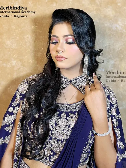 This pose highlights the contouring and the shimmer on the eyes, essential skills for creating makeup that looks stunning under party lights.