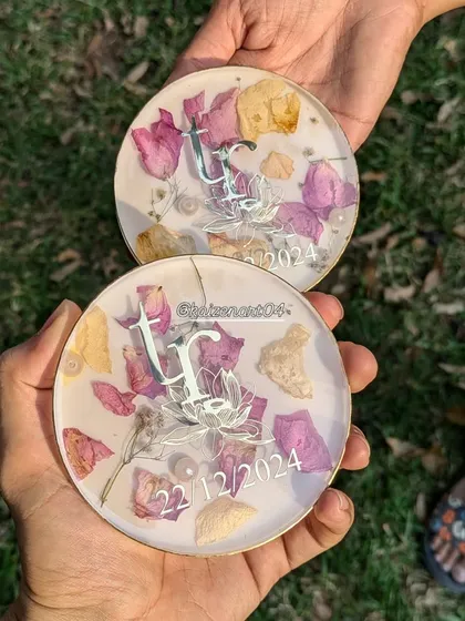 This set of coasters was made from wedding flowers, with the couple's initials and wedding date. It's a lovely way to have a small reminder of your big day.