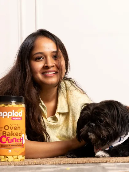I believe in products that are both healthy and delicious. Here is a happy moment with our own brand of Applod oven-baked crunch biscuits, which are gluten-free and made with real ingredients like chicken and peanut butter.