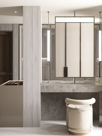 For a luxury residence, we designed a seamless open ensuite that combines the walk-in closet and bathroom. This functional layout, featuring a back-to-back dresser and washbasin, maximizes space and creates a refined, personal sanctuary.