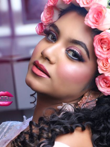 A more artistic shot of the floral crown look. The white eyeliner in the waterline makes the eyes pop, adding a modern twist to the otherwise soft and romantic makeup.