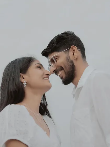 An intimate close-up, nose-to-nose, highlighting their happy connection.